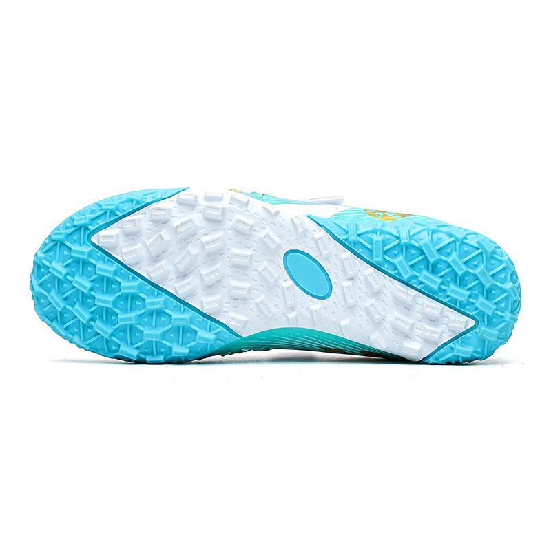 Nuevos zapatos de fútbol transfronterizos transpirables para niños y niñas zapatos de fútbol de interior zapatos de entrenamiento de césped zapatos de fútbol antideslizantes