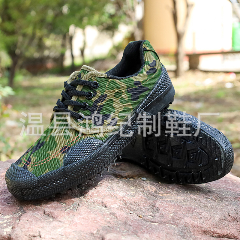 Suela de goma vulcanizado liberación zapatos de trabajo bajo-top entrenamiento estudiantes entrenamiento densos picking zapatos fábrica zapatos de liberación al por mayor