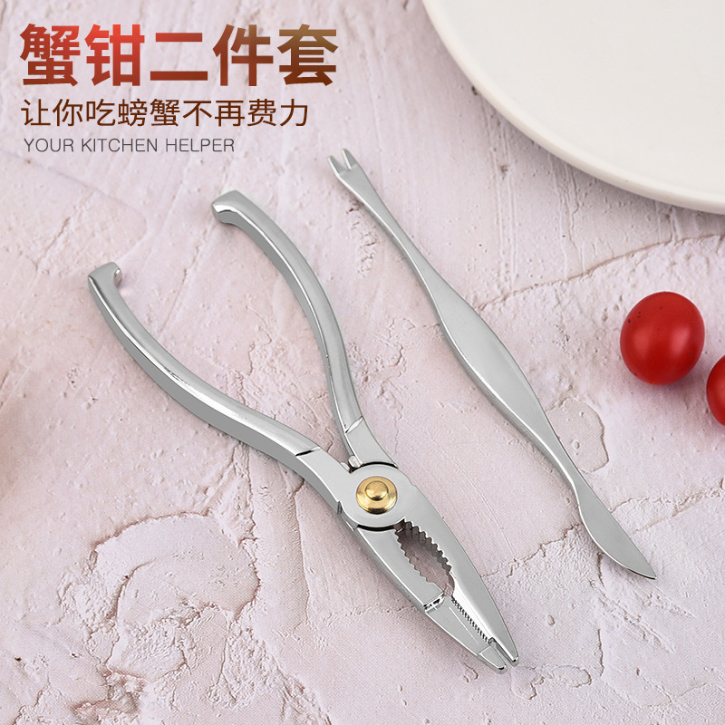工場の現物のステンレスのカニのはさみの工具の2セットの海鮮のレストランはカニの用具のホテルのカニのスプーンを食べて卸売りします。|undefined