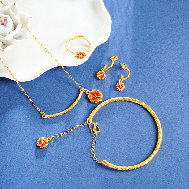Vietnam Shajin Gesang Flower Series Pendientes Collar Anillo Temperamento simple Pulsera Twist Juego de cuatro piezas de imitación de oro