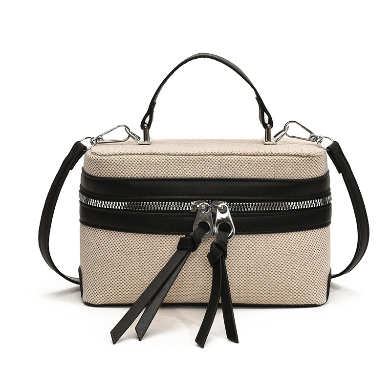 2025 nuevo nicho de diseño retro color contrastante empalme bolso de mano personalidad viaje elegante mochila de hombro