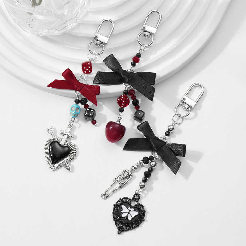Cross-border Hot Sweet Cool Dark Gothic Black Bow Skull Dice Cherry One-shot Heart Keychain Cross-border Hot Sweet Cool Dark Gothic Black Bow Skull Dice Cherry One-shot Heart Keychain