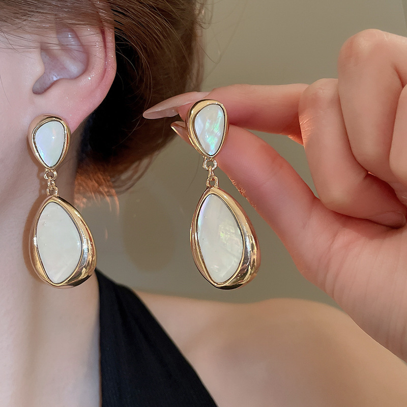 Pendientes de flor de lazo elegante de súper hada de plata Pendientes de moda de lujo ligero francés Pendientes de todo fósforo dulce de estilo literario