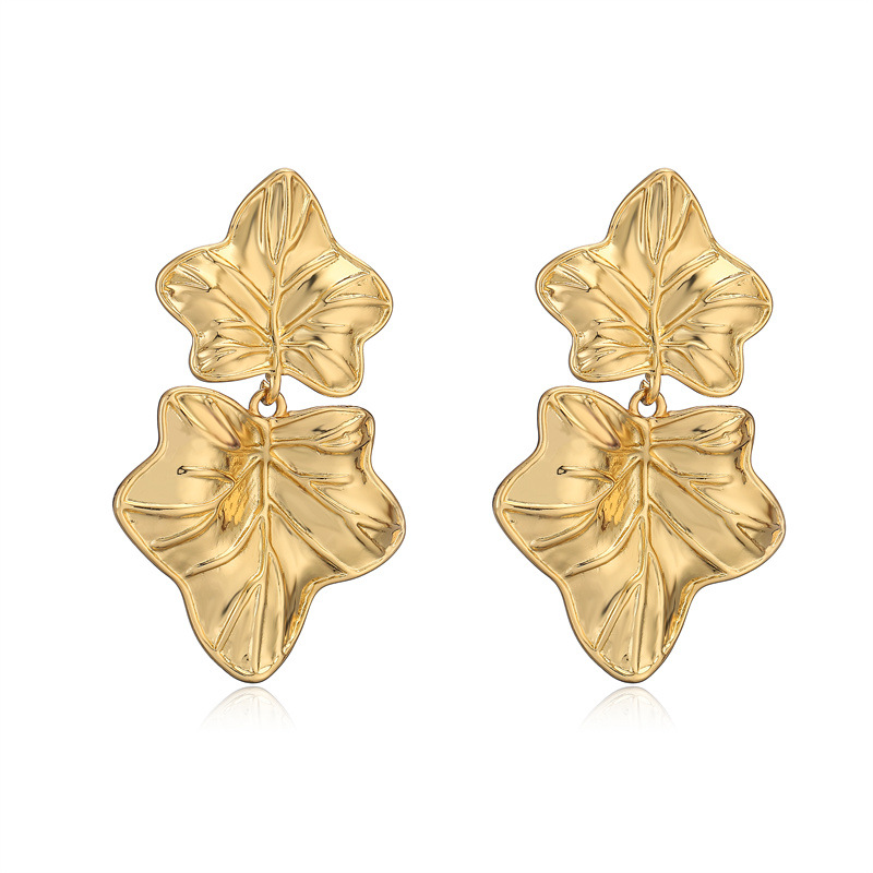 Europa y los Estados Unidos transfronterizos 18K metal de moda fría vientos de alta sensación pendientes de arce exagerados pendientes irregulares