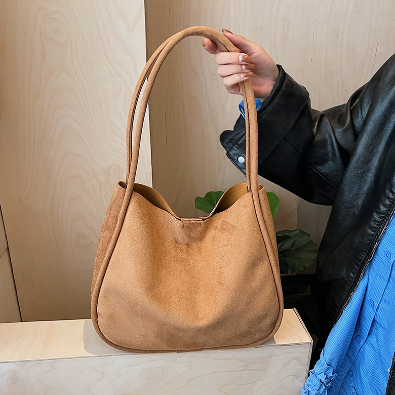 Transfronterizo 2025 otoño y invierno nuevo retro cubo de cuero de seda bolsas de mano para mujeres bolsas de braza simple y versátil bolsas de hombro de viaje