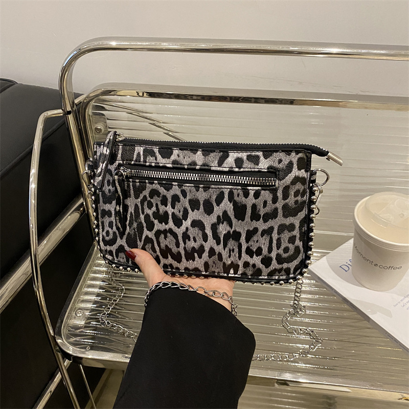 Casual coreano simple bolso de mano retrógrado personalidad bolso de mano para mujeres 2025 primavera nueva moda brillante bolso de hombro