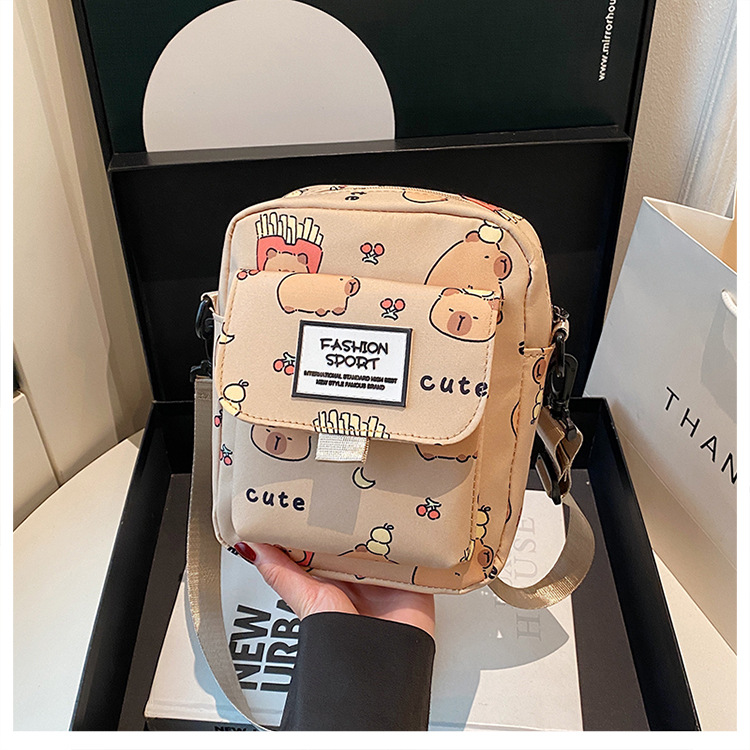 Cartoon animal print, many pockets, few bags, single-shoulder bag for girls, large capacity, cute graffiti, lightweight schoolbag for primary and middle school students undefined