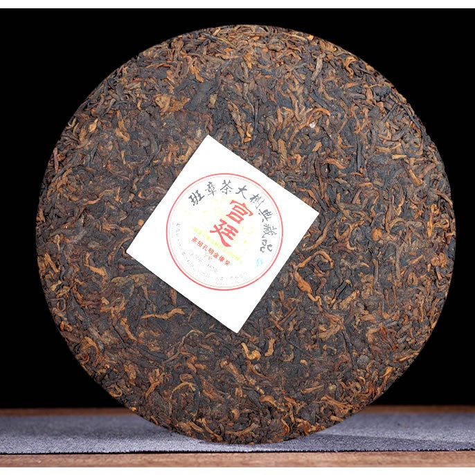 7餅は2009年にモウ海天人人プーアル茶熟茶宮廷班章茶大樹典コレクション七子餅をまとめた