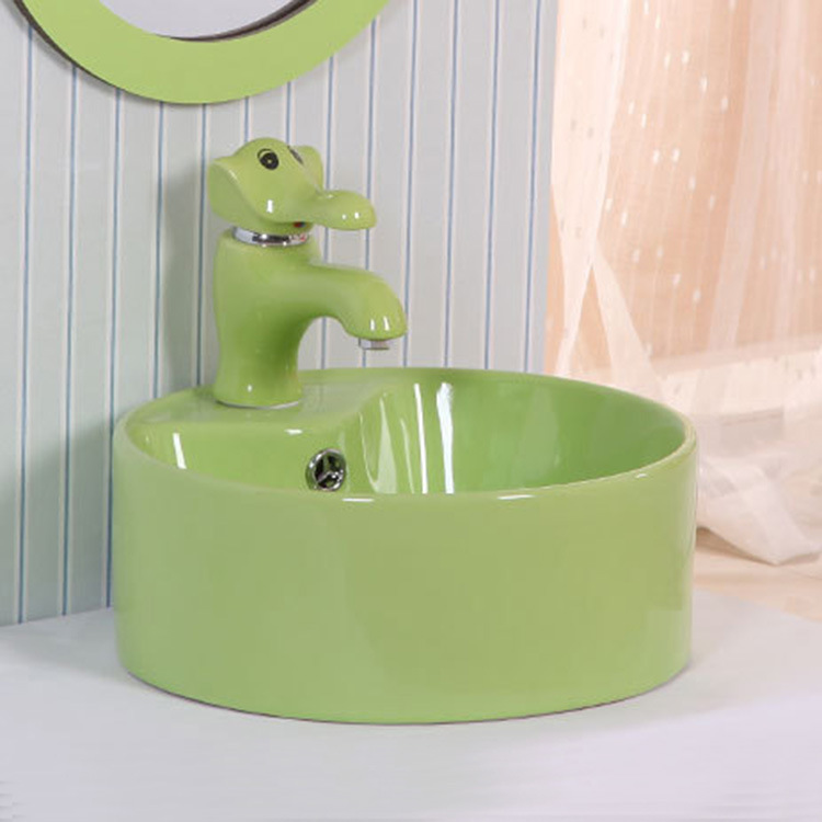 Lavabo de color para niños de jardín de infantes lavabo de cerámica tamaño pequeño lavabo para niños mesa redonda lavabo fabricante
