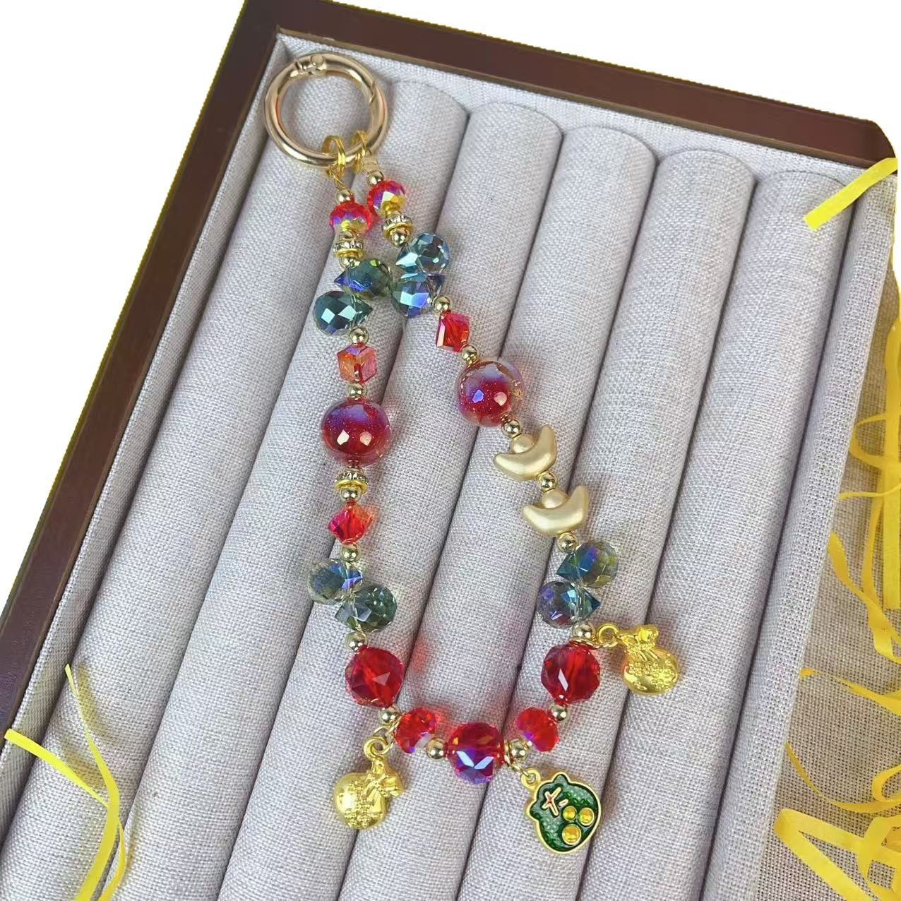 Alta sensación de cuentas de vidrio esmaltado cadena de teléfono móvil pulsera colgante de moda explosión de cristal cuentas de llavero bolsos colgante