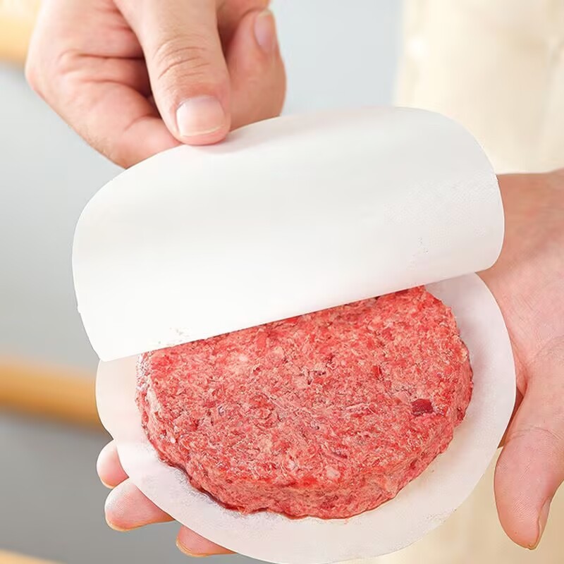 アマゾンの爆発的なハンバーガーは肉紙を押して円形のシリコン油紙を焼く|undefined