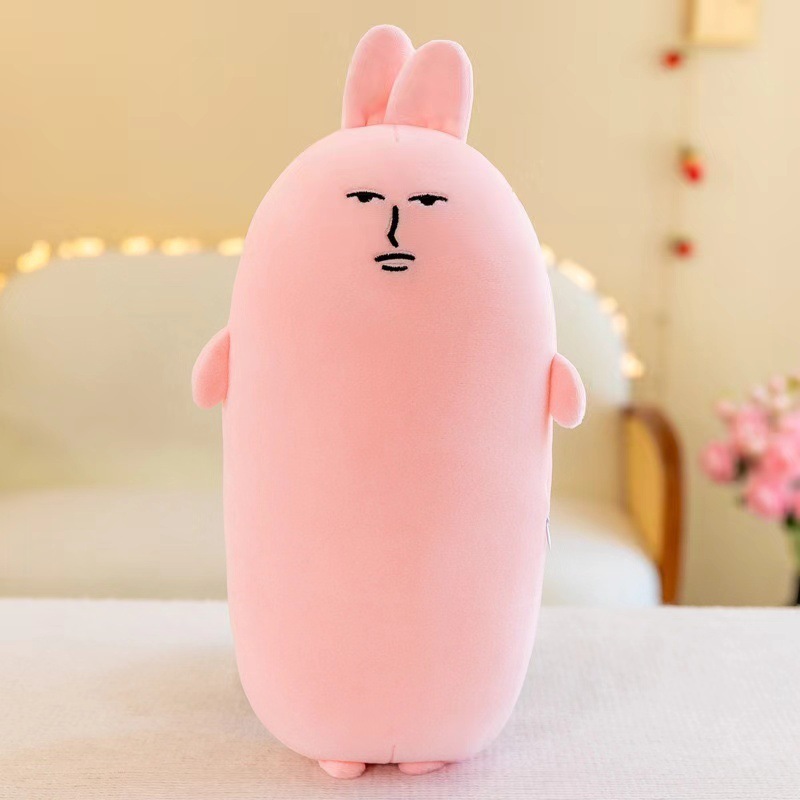 爆発的なピンクのウサギの長いバーは枕のベッドの上で足のぬいぐるみの女の子のプレゼントの子供のプレゼントの卸売りを挟みます。|undefined