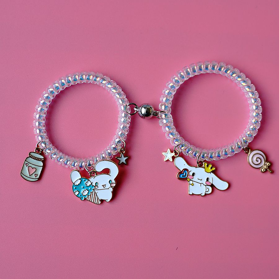 thumbnail image 1 of Línea de teléfono de pareja de succión magnética femenina de cuerda de cabeza japonesa y coreana para enviar novio ins vibrante canela perro atracción mutua novias pulsera helado y dos piruletas, 1 of 2