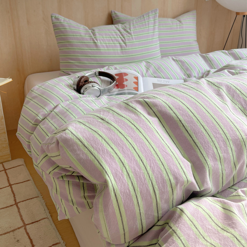 Una clase de algodón cuatro piezas de tejido de agua lavado sábanas de algodón cubierta dormitorio de estudiantes cama de tres piezas de impresión y teñido activo