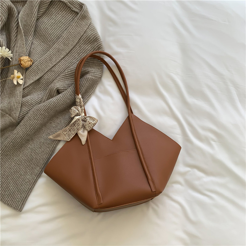 Bolsos para mujer 2025 primavera nuevo bolso de mujer de moda de gran capacidad que viaja con un solo hombro bolso popular Tote bolso bufanda de seda