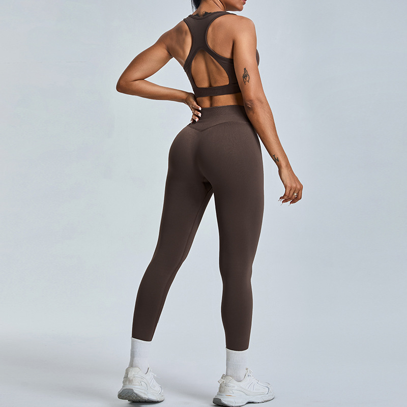 Nuevo traje de ropa de yoga sin costuras europeo y americano, pantalones deportivos de melocotón ajustados con espalda hueca para mujer, traje de ropa de fitness de yoga