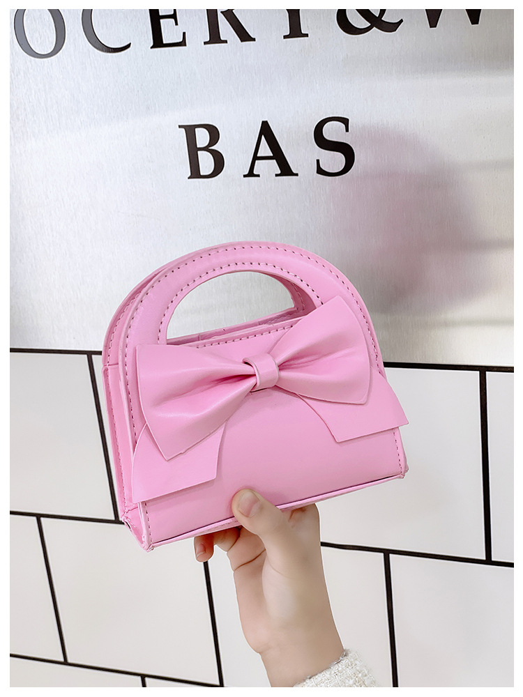 Bolso infantil nuevo arco de color caramelo mini bolso de mano chaîne de conchas de padres e hijos bolso de lápiz labial