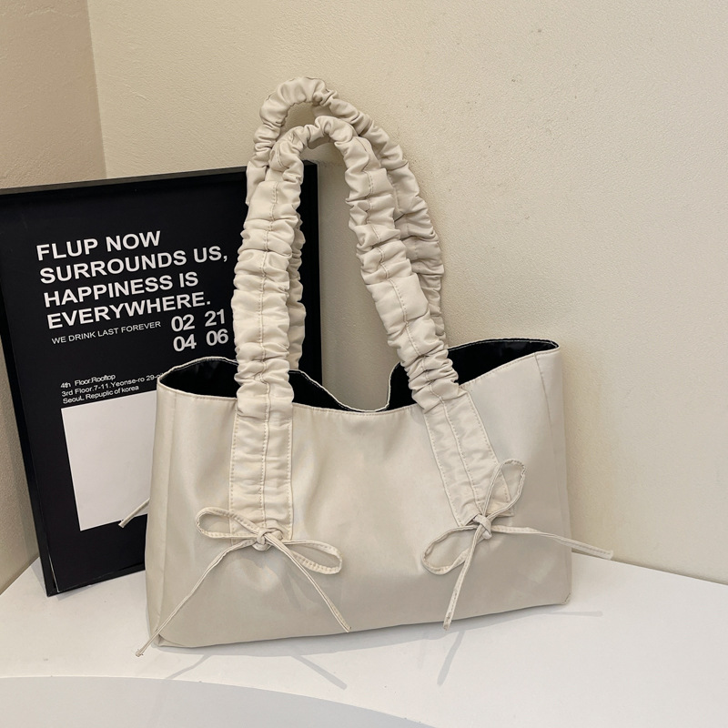 Bolsos de arco de textura de alta calidad, bolsas de nylon de alta capacidad, damas 2025, bolsas de moda, bolsas de nylon casuales de gran capacidad