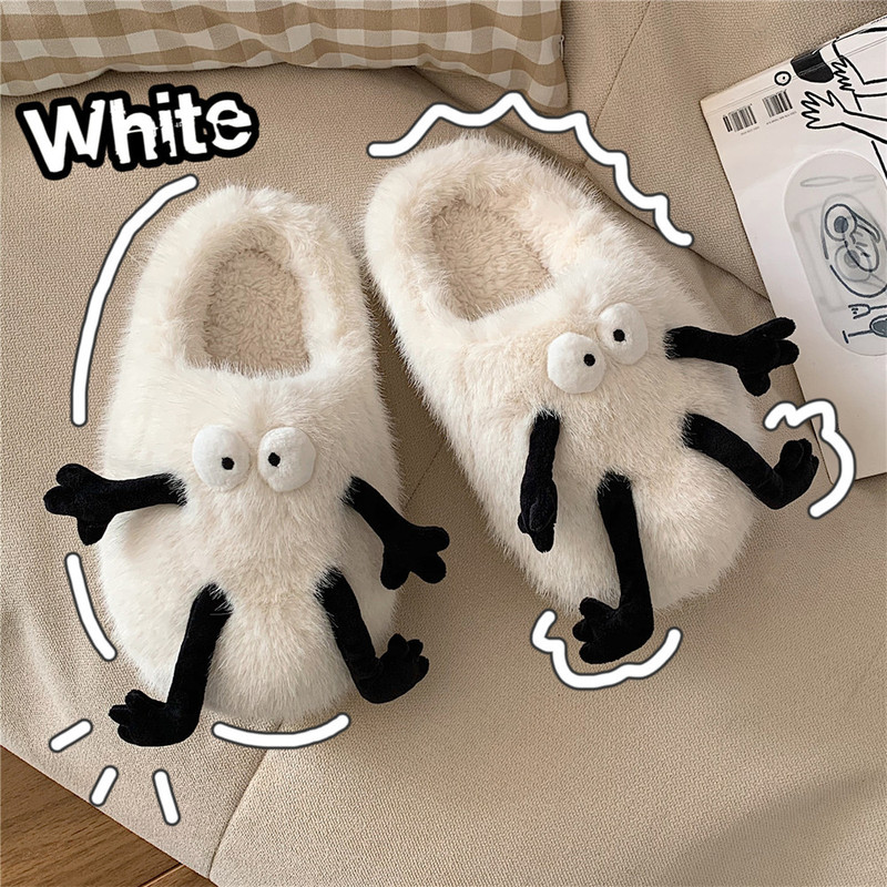 女性の冬の個性のかわいい小さい黒いボールの毛の絨毛の頭の綿のスリッパは糞を踏んで感じます。|undefined