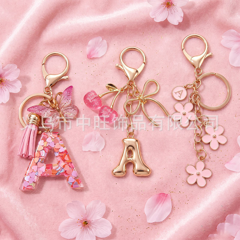 Cross-border bestseller: three-piece set with pink elements, cherry blossom initial letter bag pendant, 26-letter keychain Cross-border bestseller: three-piece set with pink elements, cherry blossom initial letter bag pendant, 26-letter keychain