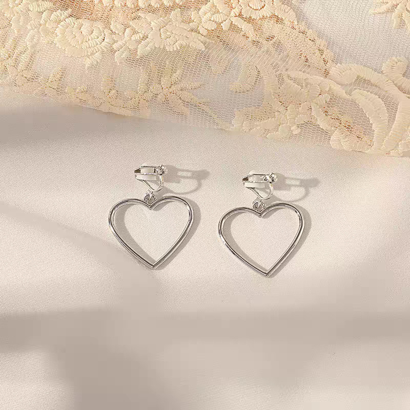 2025 nuevo estilo flor borla sin agujeros para las orejas placa de incienso para mosquitos pinzas para las orejas para las mujeres, pendientes de lujo ligero de alta calidad, pinzas para las orejas indoloras