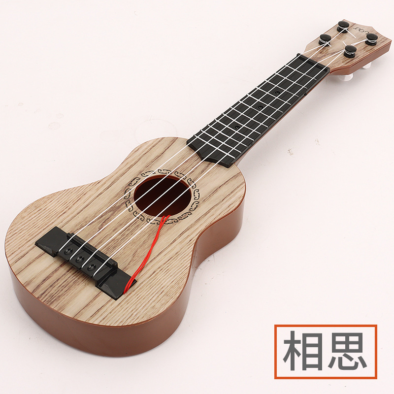 Dibujos animados ukelele guitarra pequeña niño púa instrumento musical juguete puede tocar música para principiantes juguete femenino