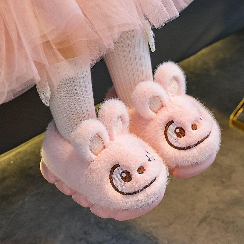 Otoño y invierno zapatillas de algodón para niños y niñas calientes y pelusa para padres e hijos antideslizantes con suela gruesa bolsas de niños y zapatos de algodón