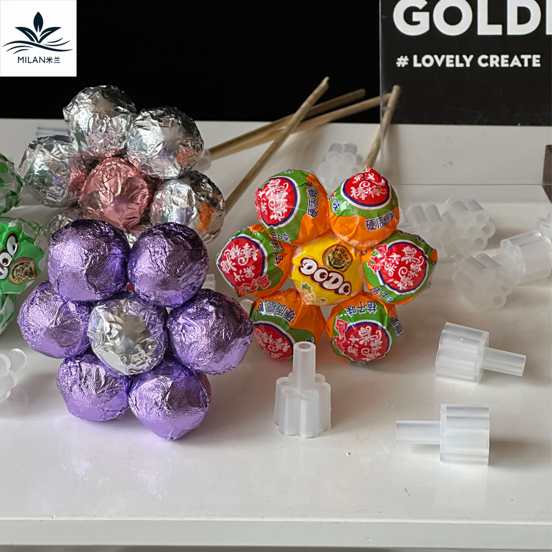 Día de los niños del 1 de junio Lollipop bocadillos paquete de flores de caramelo base fija universal paquete de materiales hechos a mano