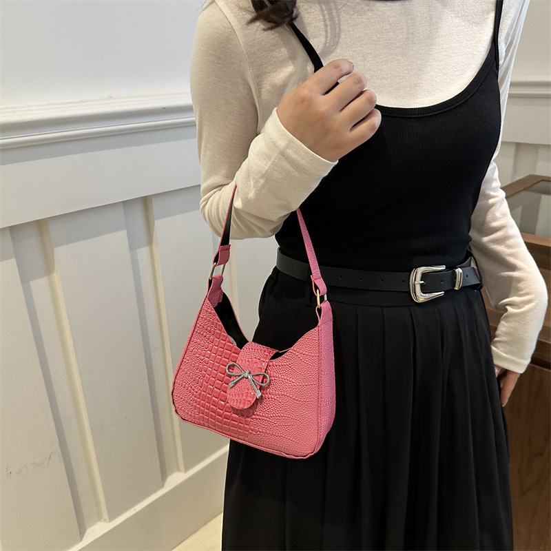 Bolso de mano con lazo de sentido de alta gama para mujer 2024 nuevo bolso de mensajero de cadena de primavera mini bolso de axila de un solo hombro