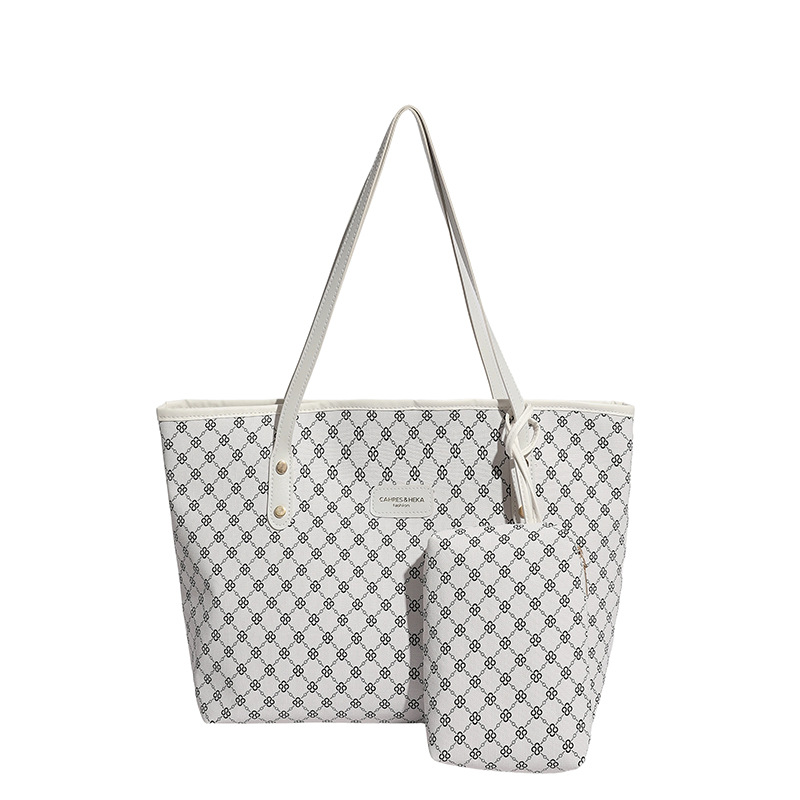 Tendencia transfronteriza coreana bolso de mano bolso de mujer 2025 nuevo invierno estriado bolso de hombro ligero de lujo bolso de brazos