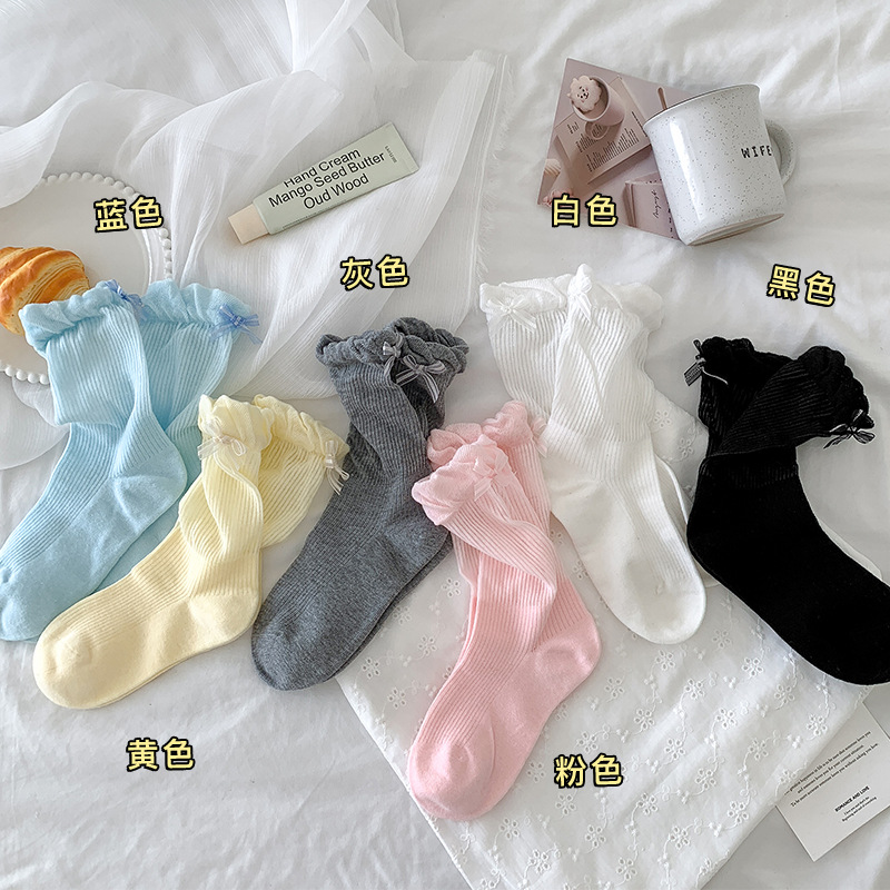 Miu serie calcetines mujer primavera y verano nuevo producto tacón lazo pila de calcetines capullo máquina todo en uno deshuesado tubo central Lolita