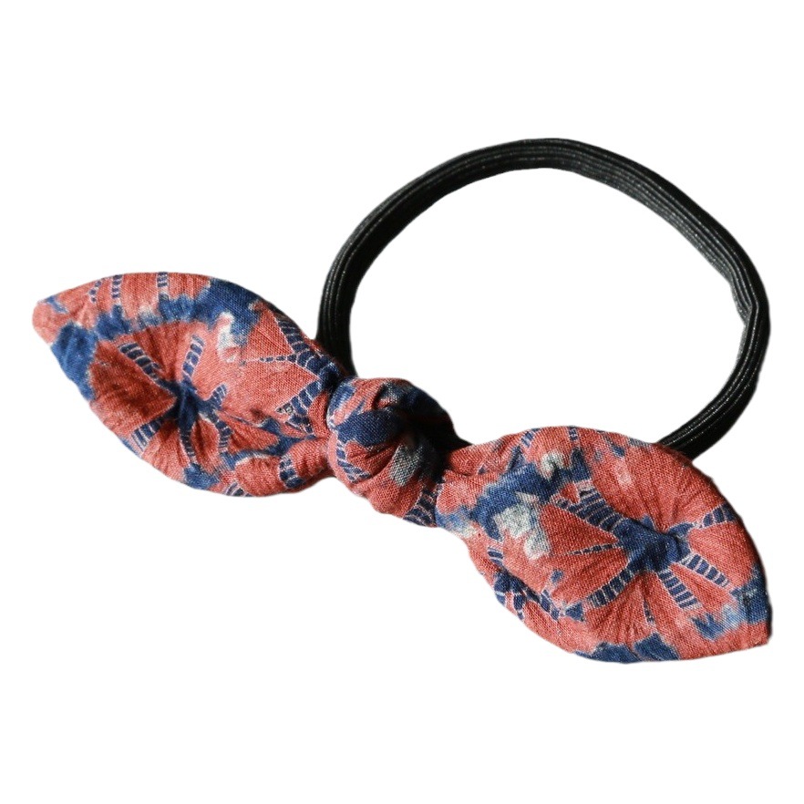 Tie-dyed bow headdress flower