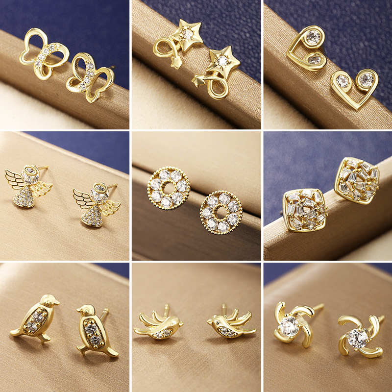 Joyería Xuping aleación de cobre chapado 14K oro pequeño pendientes de alta sensación de nicho ligero pendientes de zircón de lujo pendientes