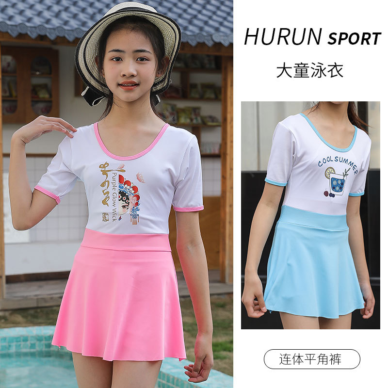 2023 Nuevo traje de baño de las niñas que adelgaza el vestido de una pieza lindo Maquillaje facial de estilo nacional Niños que cubren el vientre Niñas niños medianos y grandes