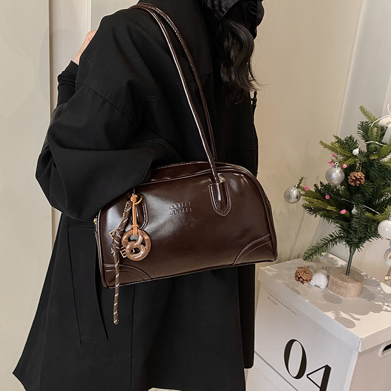 Transfronterizos de alto nivel bolsos portátiles de Boston mujeres otoño / invierno 2025 nueva moda bolsos axilales de gran capacidad bolsos de hombro