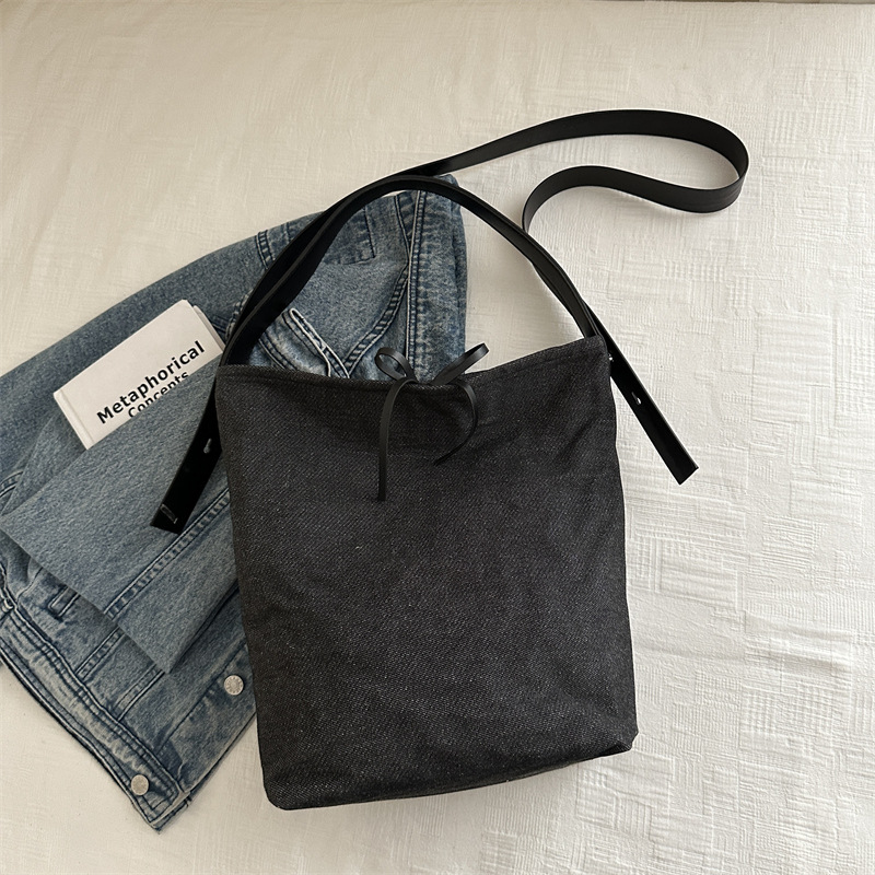 Bolso de denim de gran capacidad para mujeres verano 2024 nueva moda coreana nicho bolso de cubo bolso de hombro mochila