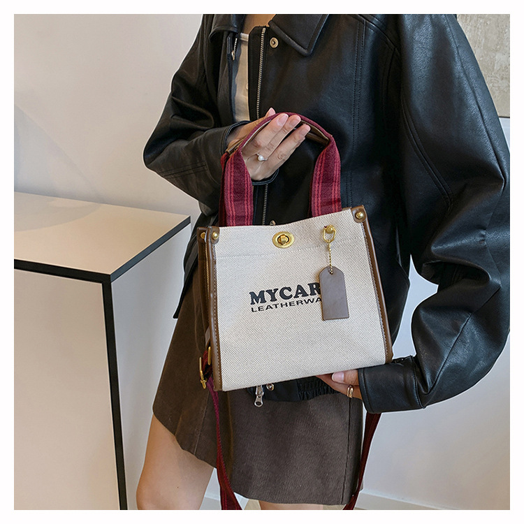Bolsa de mano de lona de gran capacidad para mujeres 2024 nueva moda impresa letras mochilas bolsa de viaje casual