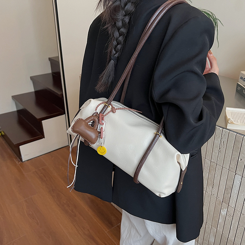 Bolsa de almohada portátil retro nicho transfronterizo para mujeres 2025 nueva moda de invierno bolso de brazo de moda bolso de hombro de viaje universal