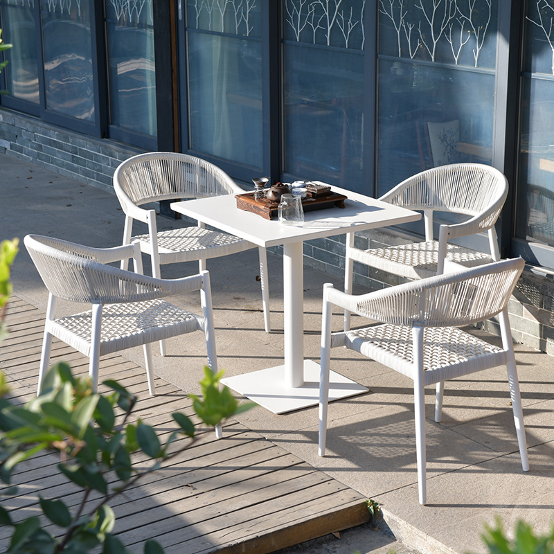 Mesa y silla al aire libre de tela de caña combinación de patio de hotel terraza jardín balcón café tela de caña mesa y silla de lujo al aire libre