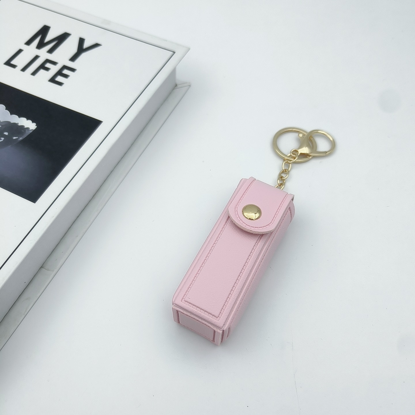 Bolso de cambio transfronterizo sobre rojo espejo creativo llavero colgante pequeño PU cuero bolso de coche accesorios accesorios en stock