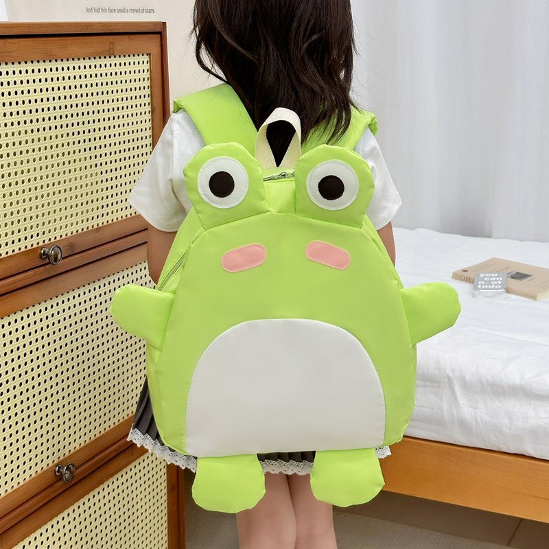 2025 nuevo bolso infantil de color de contraste cariñoso caricatura mochila de estudiantes de primaria linda forma de rana mochila para niños y niñas