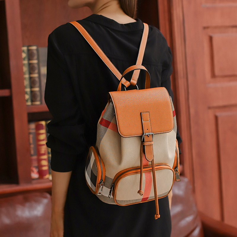 Bolso de hombro de cuero genuino mujer 2024 nueva mochila casual de gran capacidad con patrón de moda mujer bolso de viaje simple y popular moda