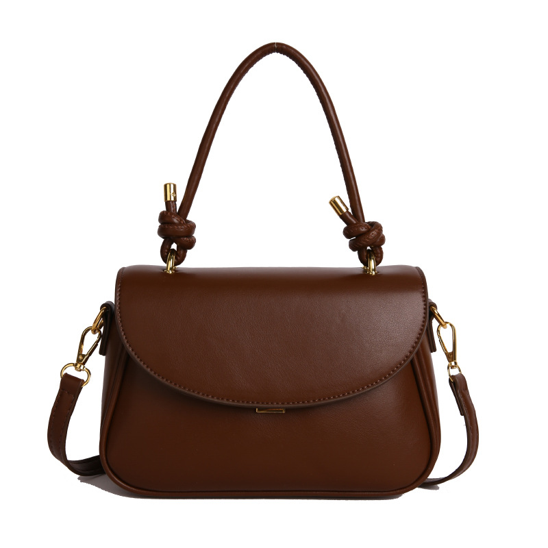 Bolso para mujeres 2025 nuevo cross-border de alta calidad textura versátil bolso portátil de color sólido de moda de viaje mochila