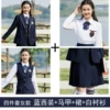 Classic suit jacket, blue pleated skirt, shirt, vest
