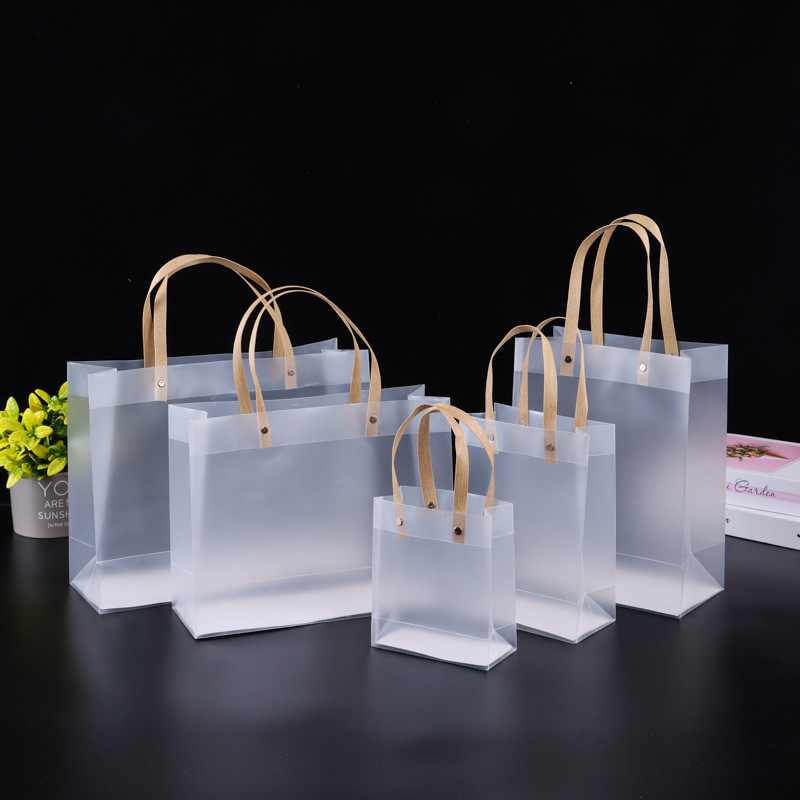 Transparent handbag cosmetics gift bag pp frosted plastic net red clothing store hand packaging bag for logo