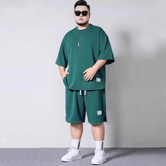 太った人は太って大きいサイズのカジュアルスーツの男性はゆったりしています。
