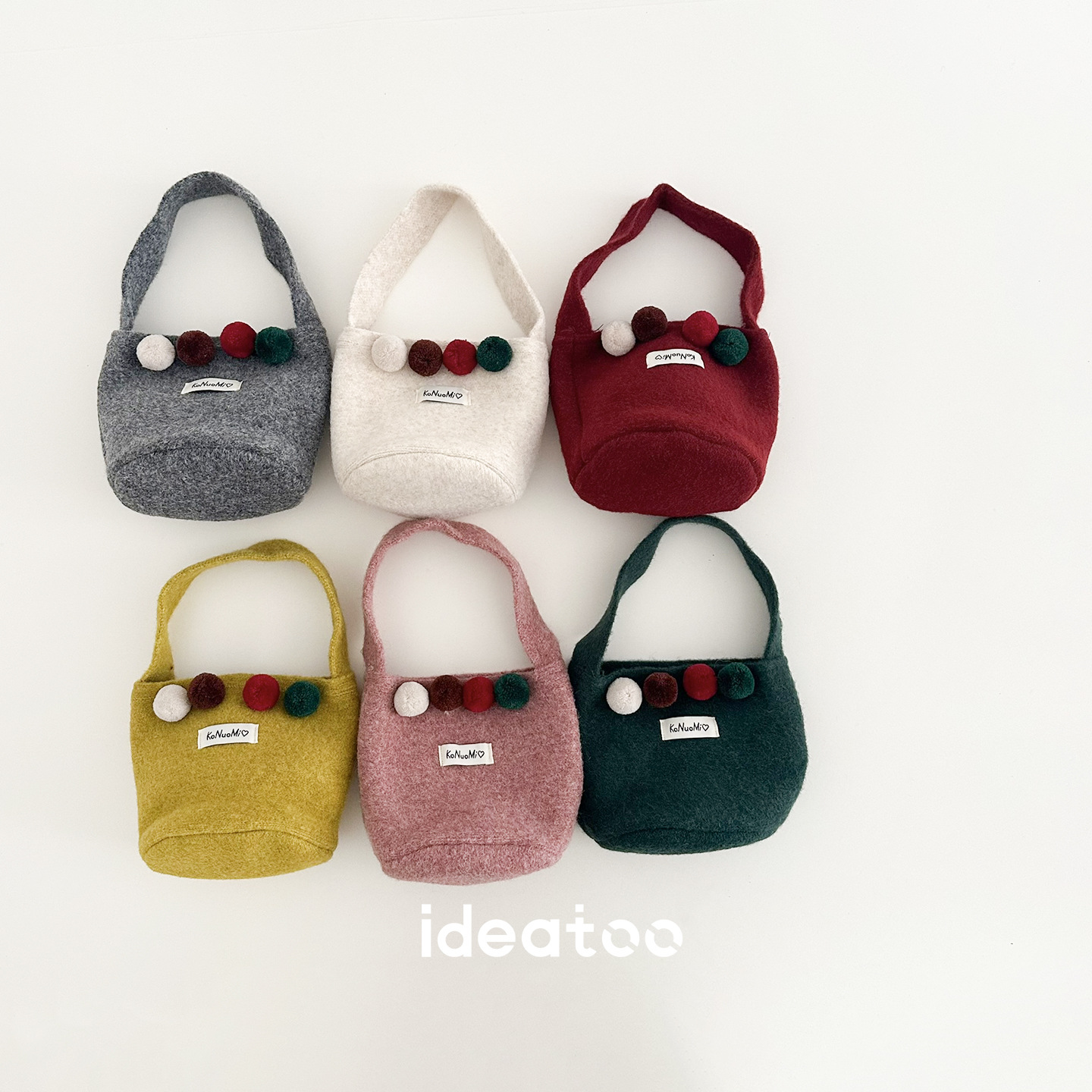 Autumn Korean-style colorful pom-pom children's handbag with felt texture, simple and versatile small purse for girls