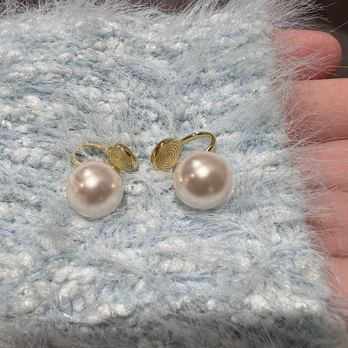 Strong light retro fever same style Shijia Pearl S925 sterling silver ear clip earrings mosquito coil disc ear clip for women without pierced ears