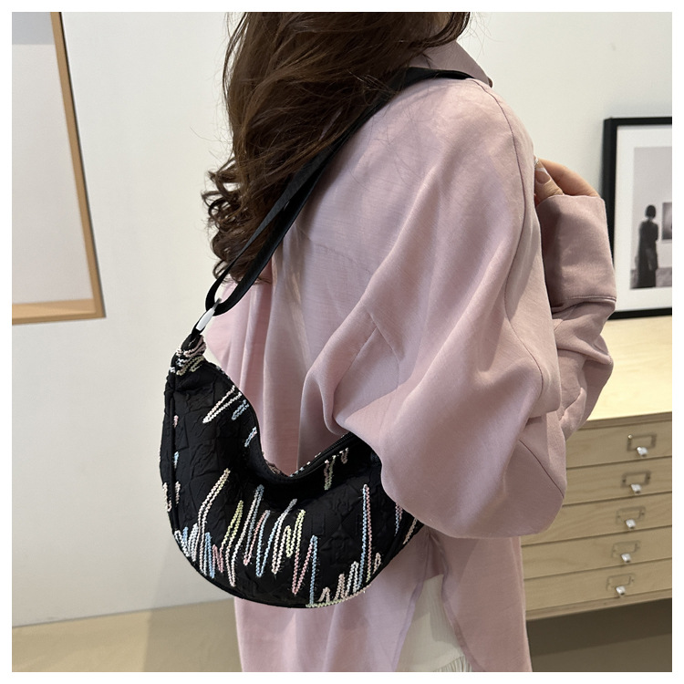 The new 2024 fashionable canvas versatile dumpling bag, a simple and stylish single-shoulder bag for commuting ladies with a high level of appearance undefined