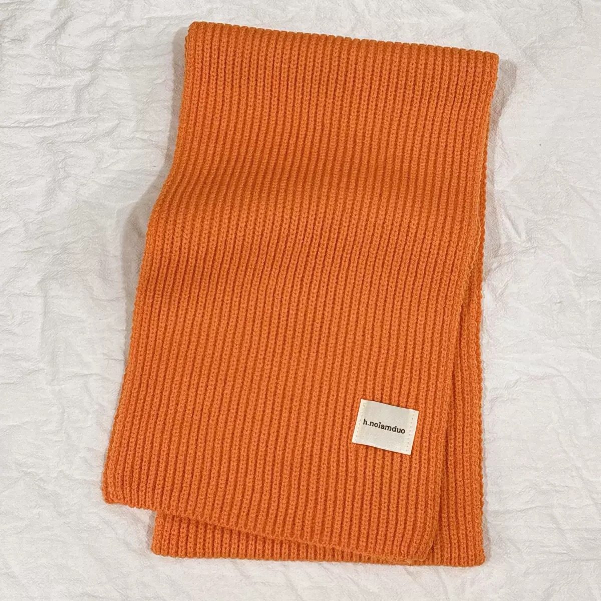 純色のニットのマフラーの女性秋冬の韓国版の学生の毛糸の百合の保温の厚いマフラーのカップルの潮男のカップル